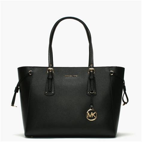 michael kors black leather handbag|Michael Kors black tote bag.